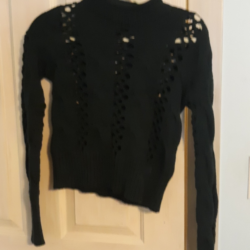 A sweater that allows some skin to show